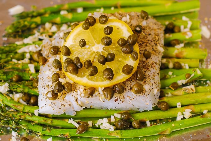 Baked Cod and Asparagus in Garlic Lemon Caper Sauce